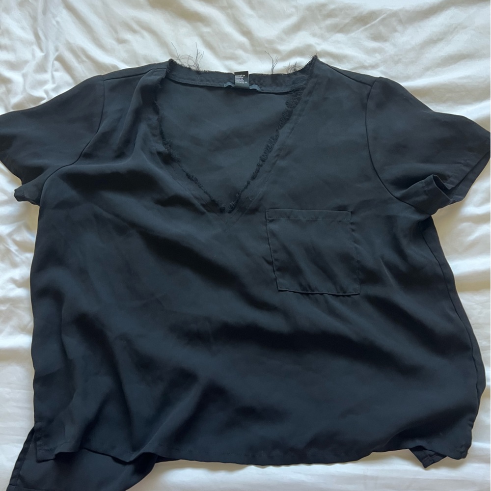 Frayed neckline top
